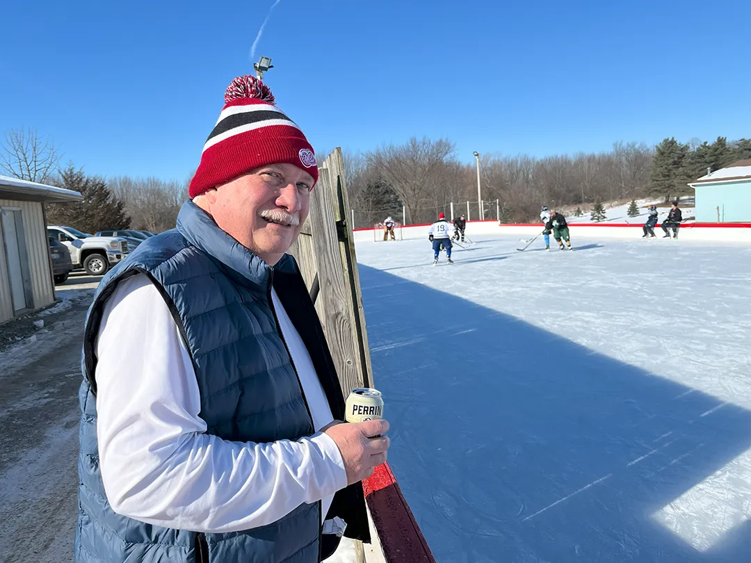 dave with post game beer watching outdoor game