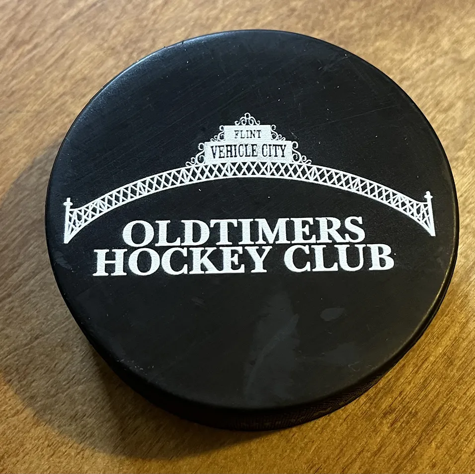 hockey puck flint oldtimers hockey club